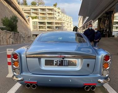 Private number plate on historic vehicle on road