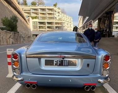 Private number plate on historic vehicle on road