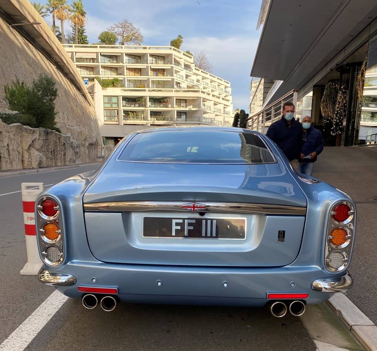 Private number plate on historic vehicle on road