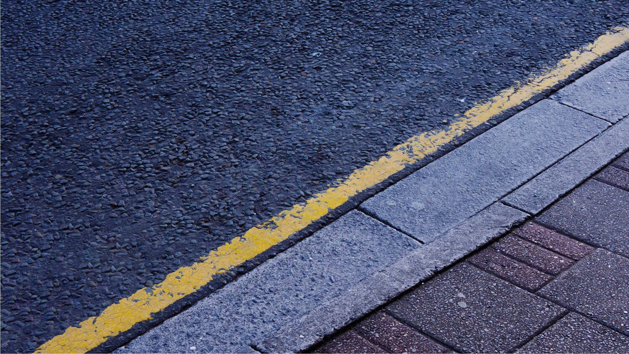 Single yellow parking lines