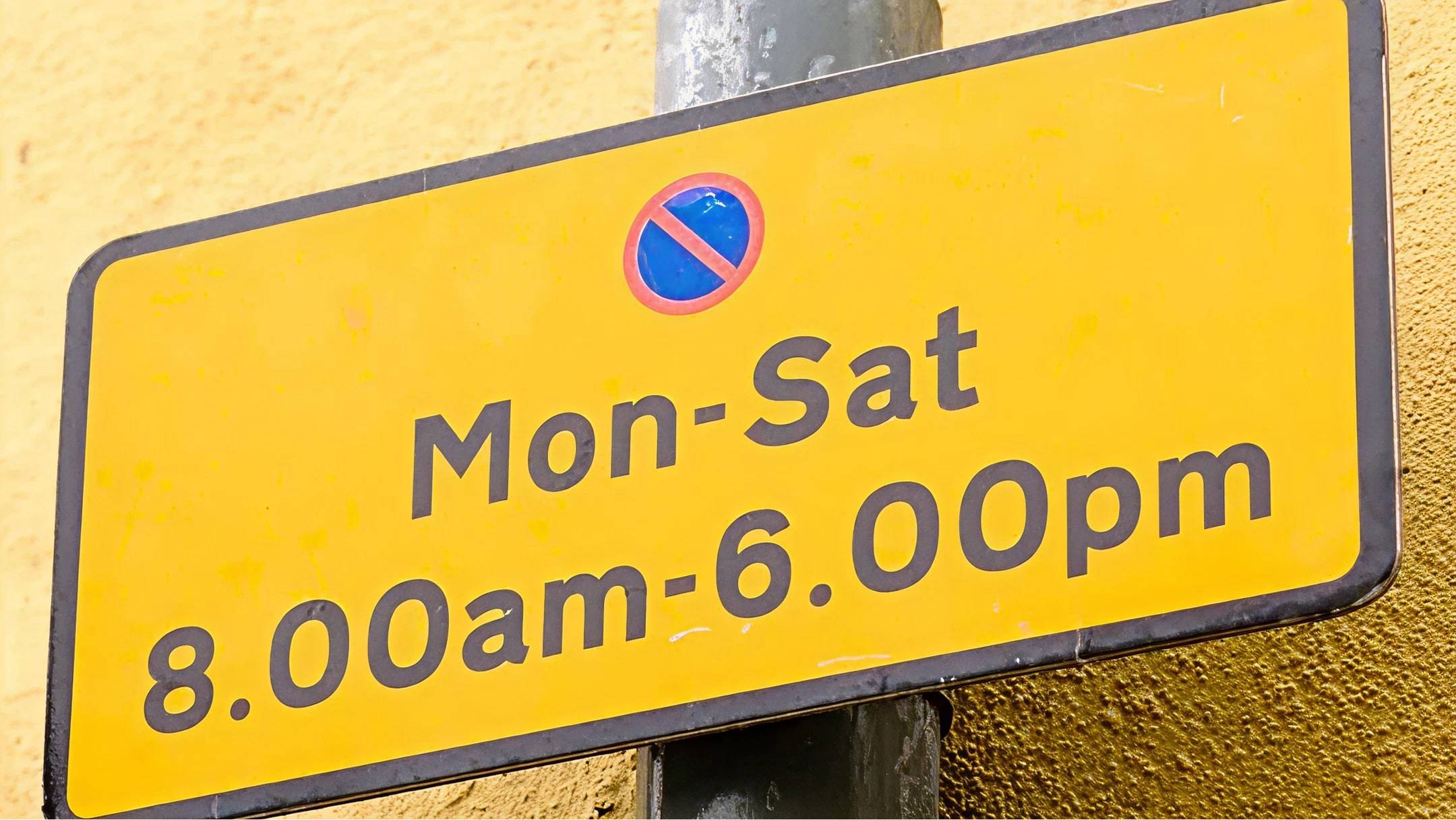 Time restrictions for parking on a single yellow line